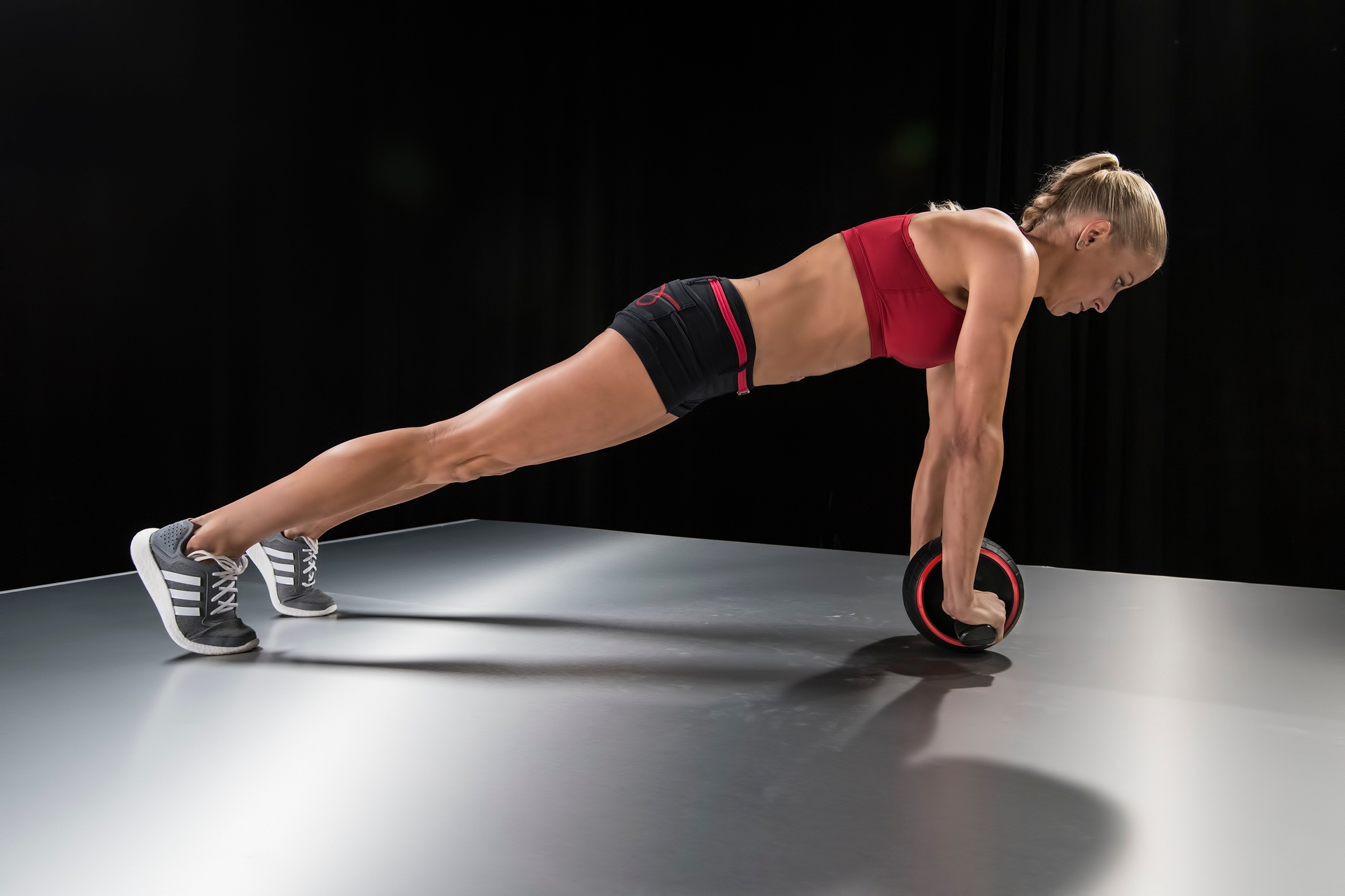 Ella Magers performing ab wheel exercise